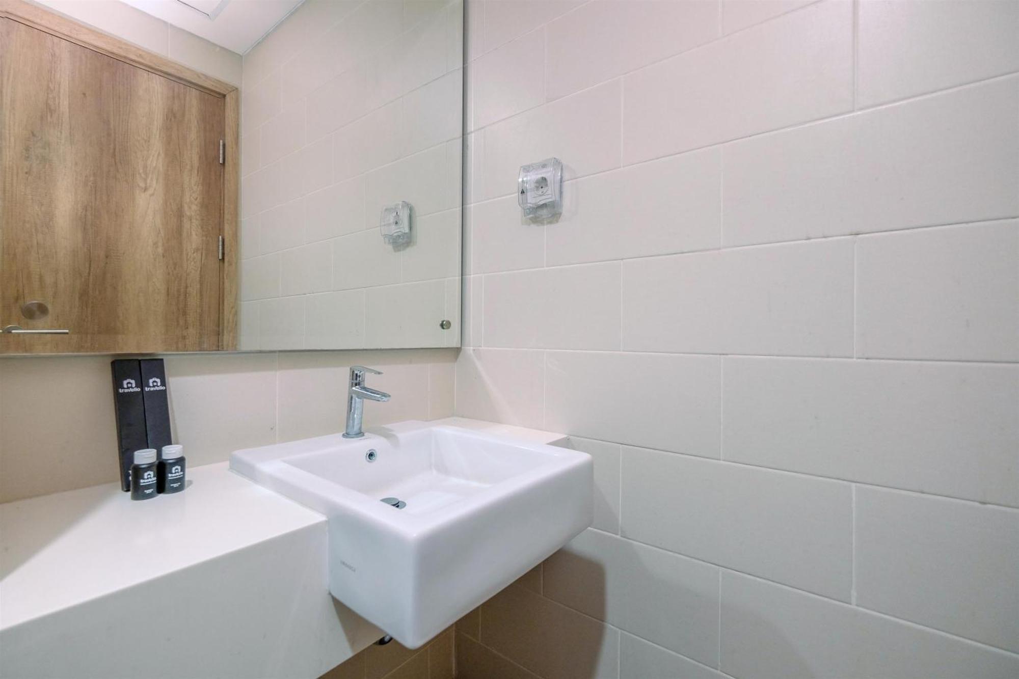 Appartement Simply 1br At Pejaten Park By Travelio
